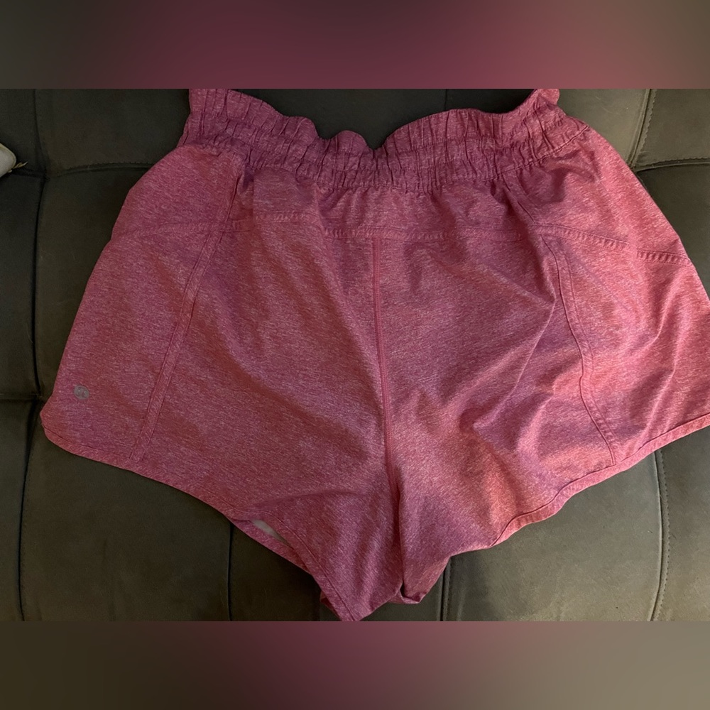 Pink lululemon track that mid rise shorts